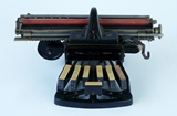 Afbeelding van een oude brailleschrijfmachine